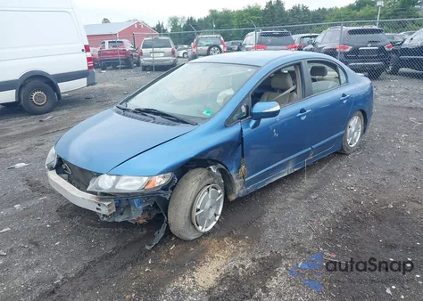 2009 Honda Civic Hybrid from USA, damaged, VIN JHMFA362X9S012707